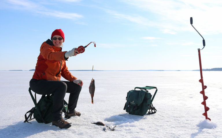 Traditional Ice Fishing Trip from Oravi